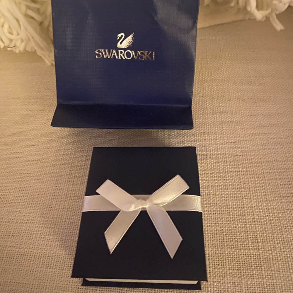 Swarovski light blue necklace and earring set.New without tags.